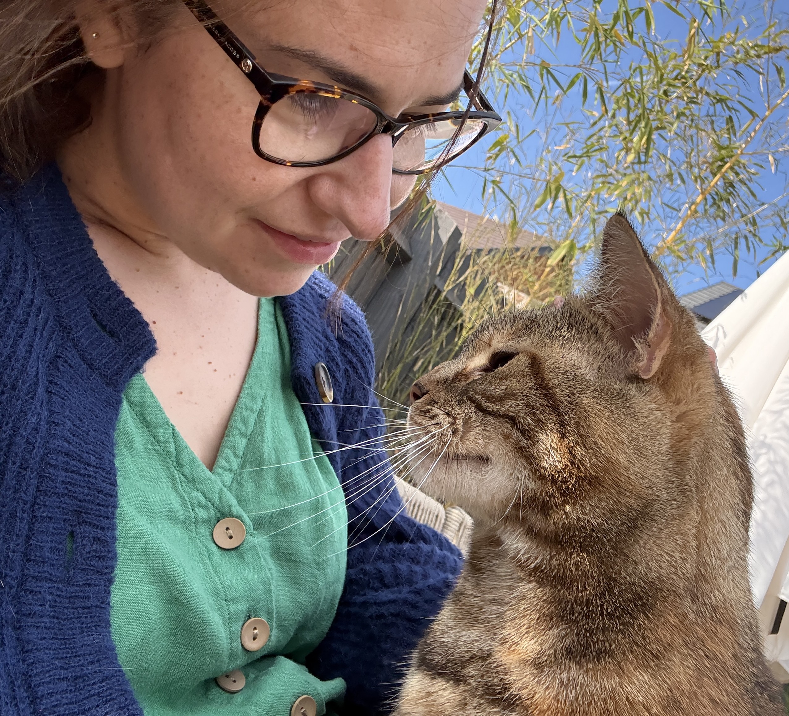 lady and tabby cat